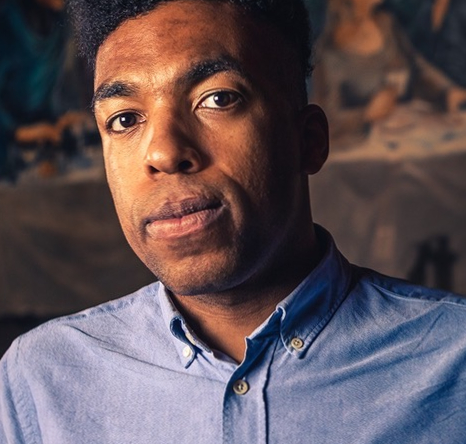 Toussaint Douglass performing comedy